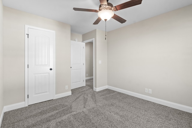 unfurnished bedroom with a closet, carpet flooring, and ceiling fan