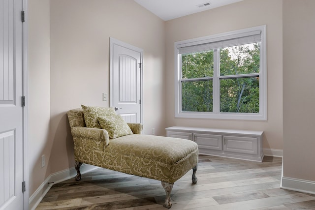 sitting room with light wood-type flooring