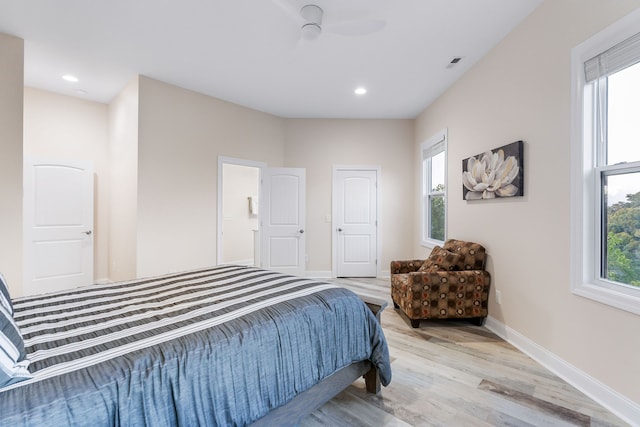 bedroom featuring ceiling fan and light wood-type flooring