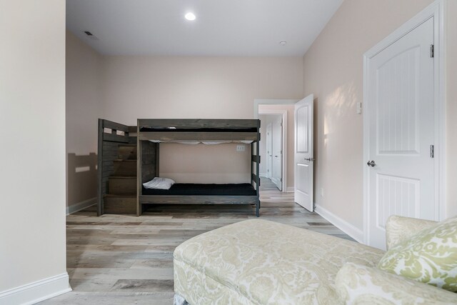 bedroom with light hardwood / wood-style floors