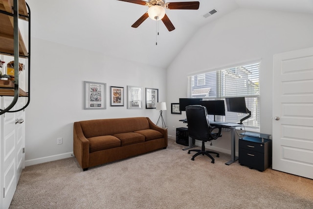 office featuring light carpet, high vaulted ceiling, and ceiling fan