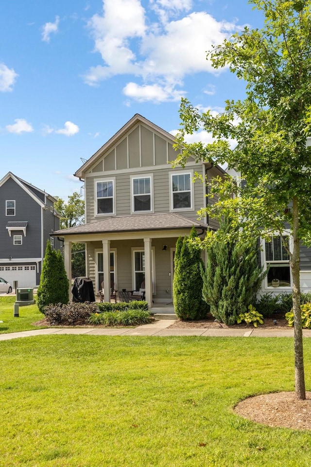 view of front of property featuring covered porch and a front lawn