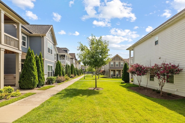 view of community featuring a lawn