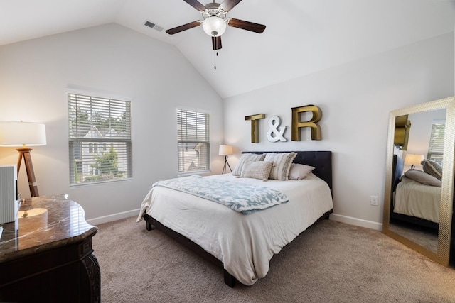 carpeted bedroom with high vaulted ceiling and ceiling fan