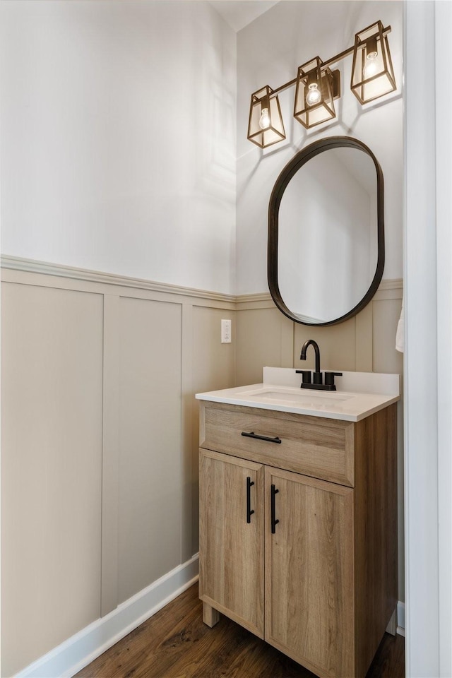 bathroom with vanity and wood-type flooring