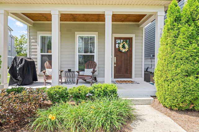 doorway to property featuring a porch