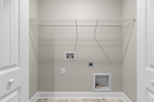 washroom featuring laundry area, washer hookup, electric dryer hookup, and baseboards