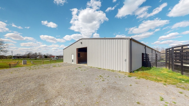 view of outdoor structure featuring a rural view