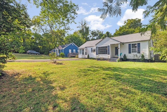 ranch-style home with a front yard