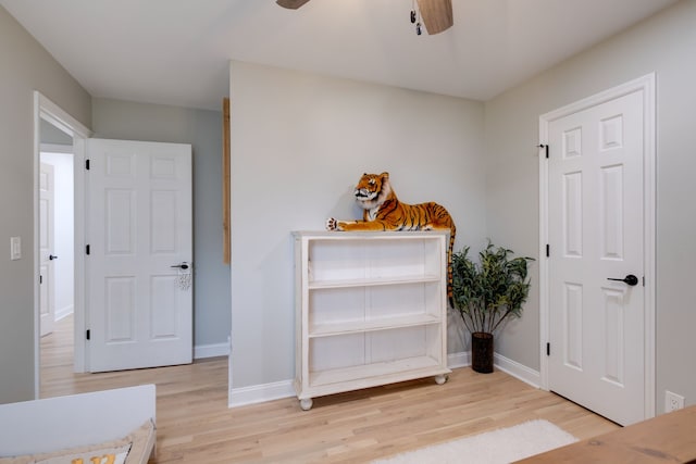 entryway featuring ceiling fan and light wood-type flooring