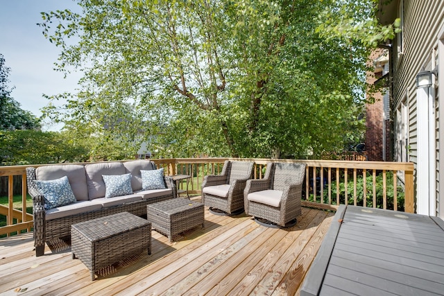 deck featuring outdoor lounge area