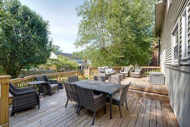 deck featuring outdoor lounge area