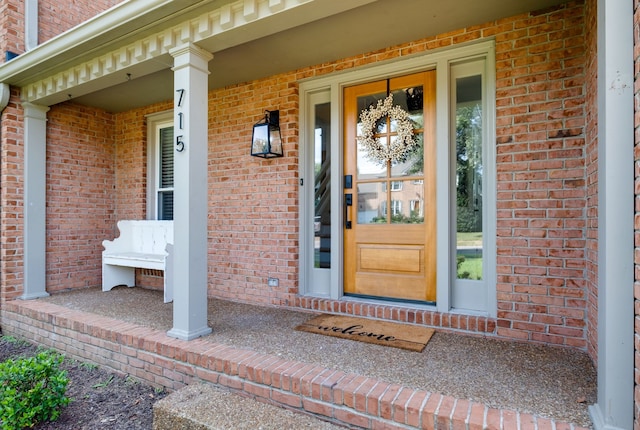 entrance to property with covered porch