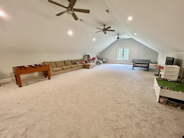 interior space with ceiling fan, light carpet, and lofted ceiling