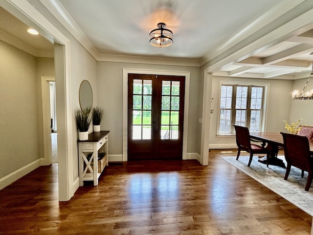 entrance foyer featuring coffered ceiling, wood-type flooring, beam ceiling, french doors, and an inviting chandelier