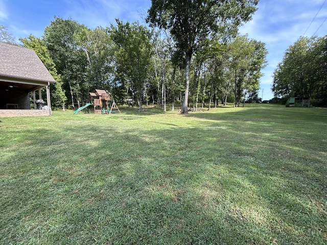 view of yard with a playground