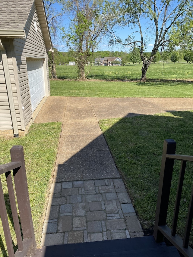 view of yard with a garage