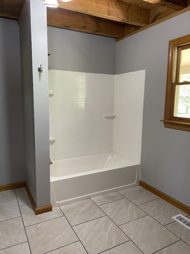 bathroom featuring tub / shower combination and tile patterned floors