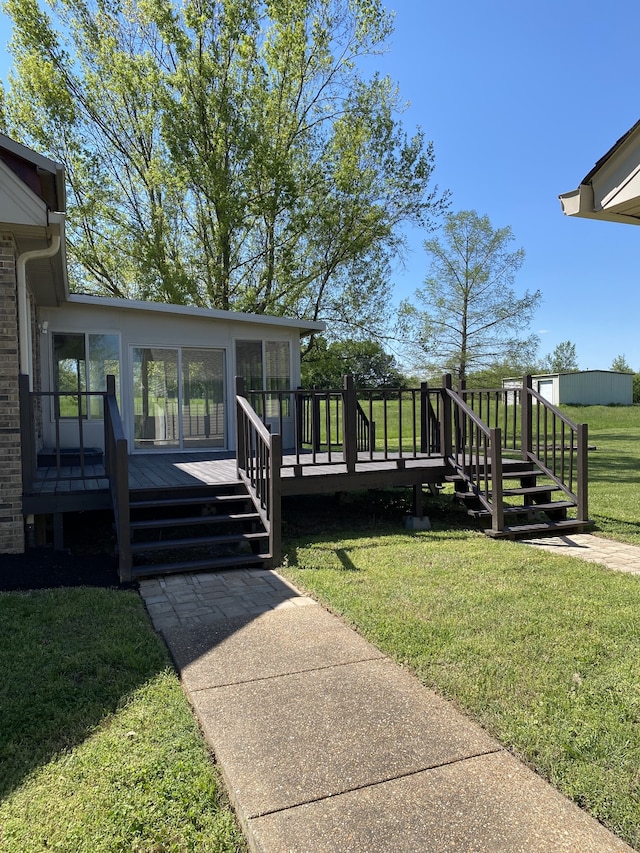 view of yard featuring a wooden deck