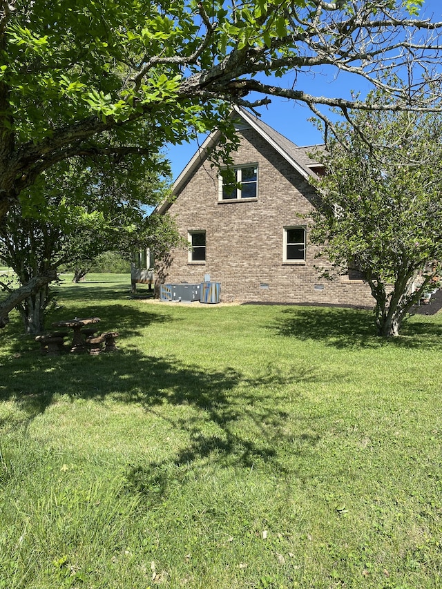 view of property exterior featuring a yard