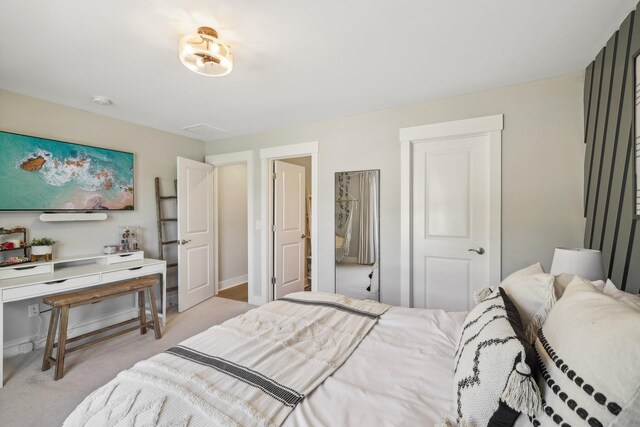 bedroom with light colored carpet