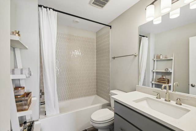 full bathroom featuring toilet, vanity, and shower / bath combo with shower curtain