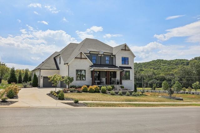 view of front facade with a garage and a front yard