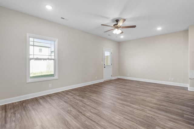 203 W Fallow Ct, Clarksville, TN 37040 - empty room with wood finished floors, healthy amount of natural light, ceiling fan, and recessed lighting