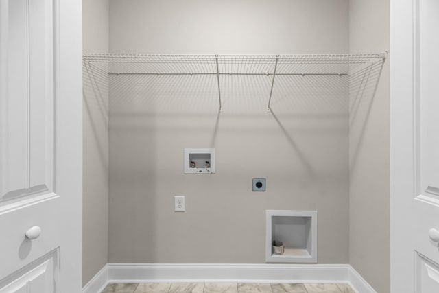 203 W Fallow Ct, Clarksville, TN 37040 - laundry room with light marble finish floors, electric dryer hookup, and washer hookup