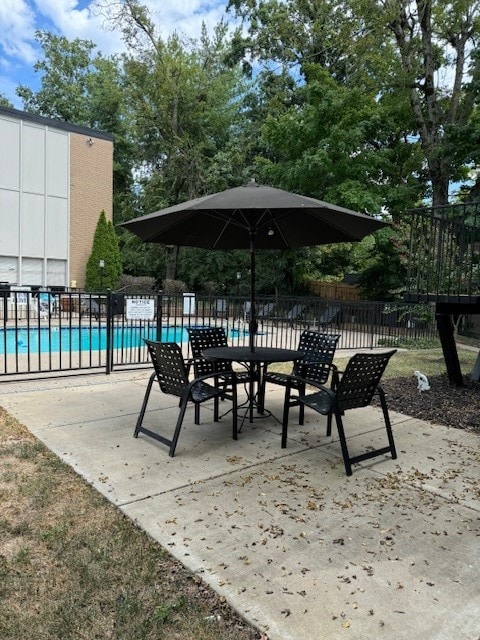 view of home's community with a patio area and a swimming pool