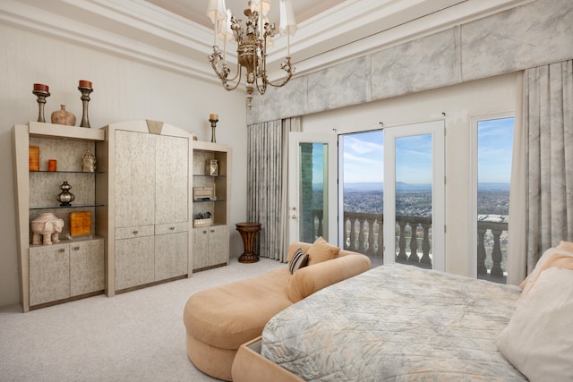 carpeted bedroom with access to outside, a chandelier, a tray ceiling, a high ceiling, and crown molding