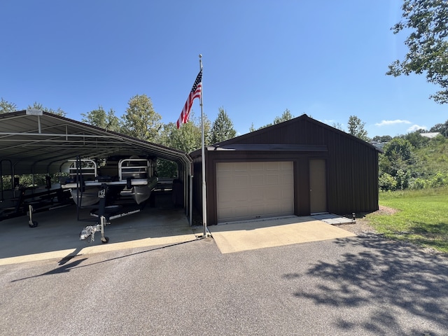 garage featuring a carport