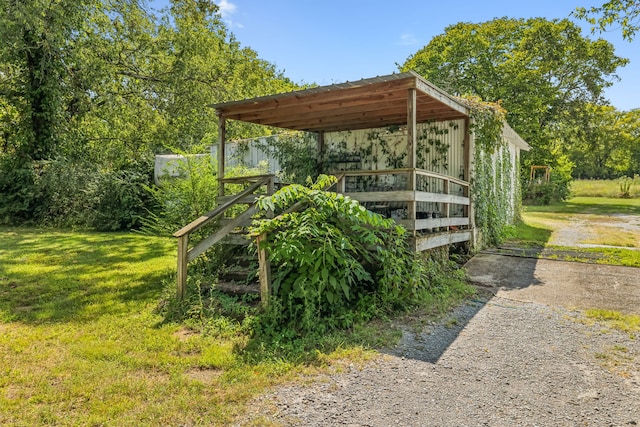 view of yard featuring a carport