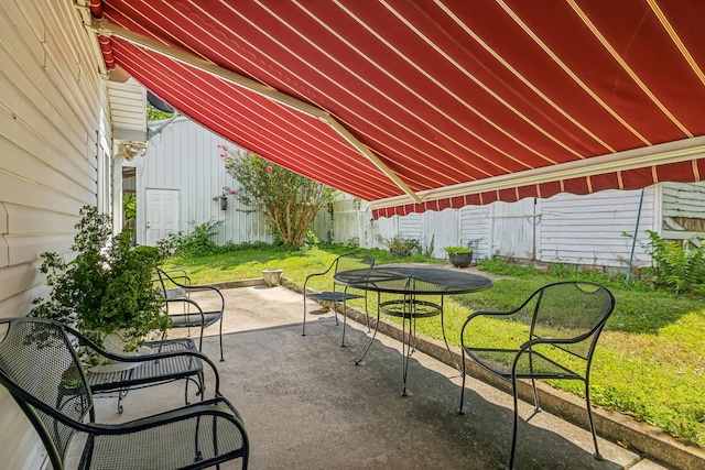 view of patio / terrace with a fenced backyard and outdoor dining area