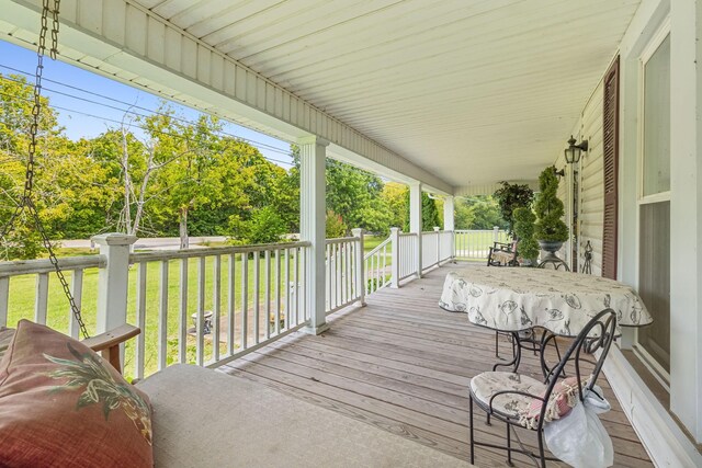 deck featuring a lawn