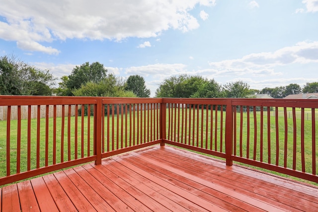 deck featuring a yard