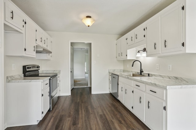 kitchen with white cabinets, sink, dark wood-type flooring, and stainless steel appliances