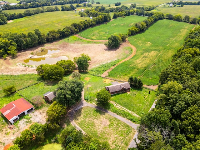 birds eye view of property featuring a rural view