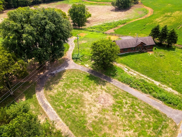 birds eye view of property with a rural view