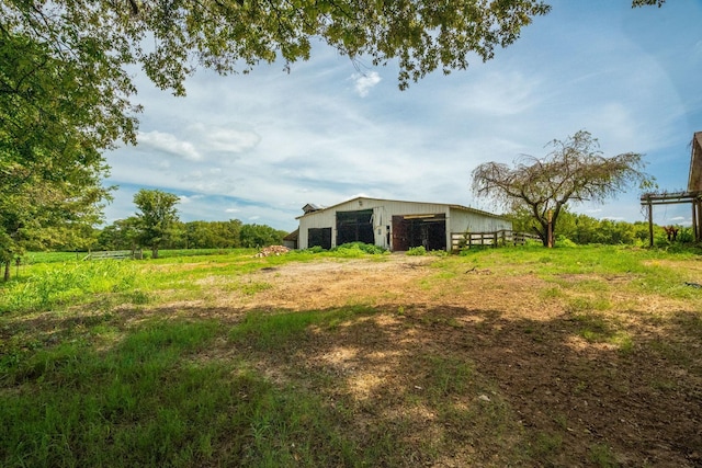 5016 Caney Sink Rd, Adams, TN 37010 - view of yard featuring an outbuilding and an outdoor structure
