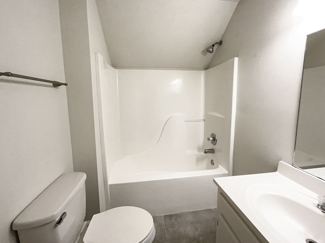 full bathroom featuring toilet, tile patterned flooring, vanity,  shower combination, and a textured ceiling