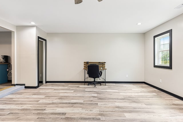 unfurnished room featuring light hardwood / wood-style flooring