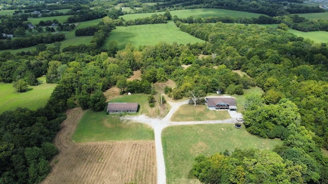 birds eye view of property featuring a rural view