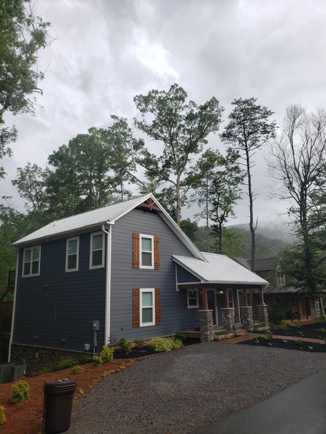 view of front of property with central AC unit