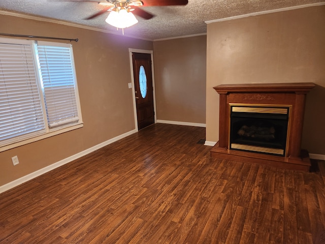 unfurnished living room featuring a textured ceiling, ceiling fan, ornamental molding, and hardwood / wood-style flooring