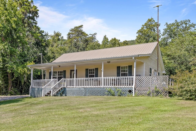 view of front of property with covered porch and a front yard