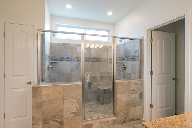 bathroom featuring an enclosed shower