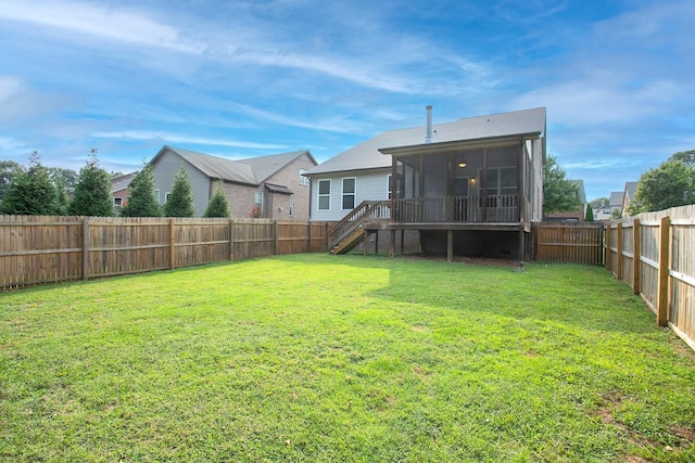 view of yard featuring a sunroom