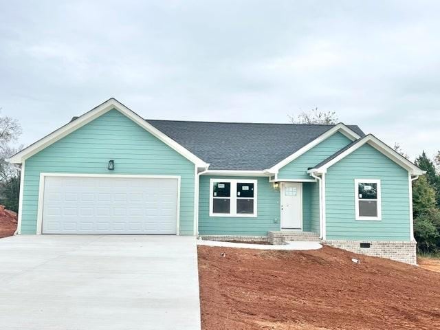 single story home with a garage