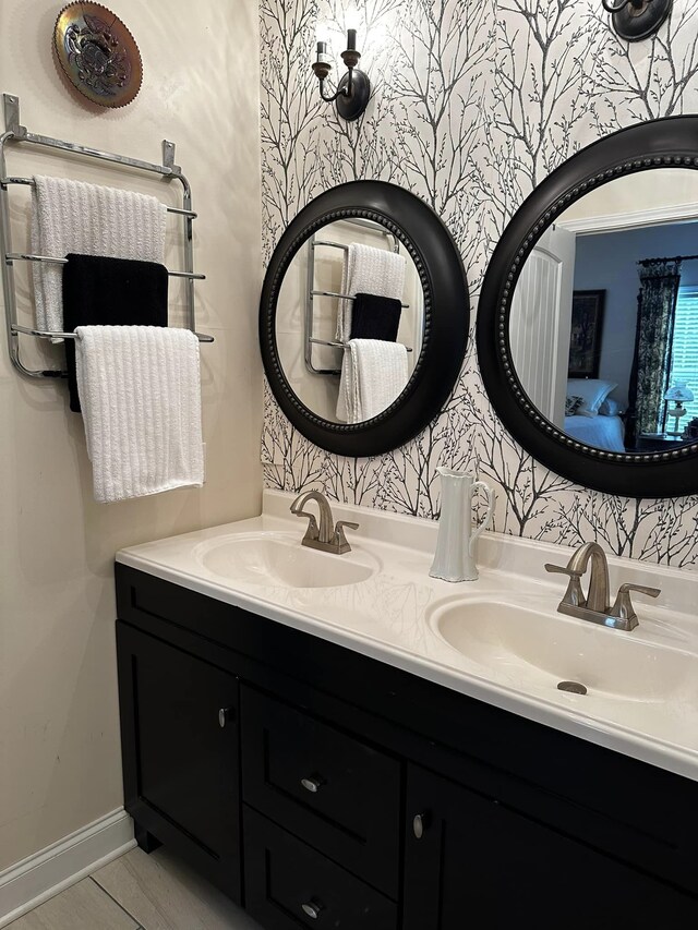 bathroom featuring double vanity